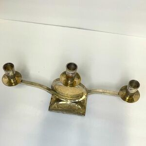 Silver hammered Reformation candleholder. Modernist style. Minimalist.